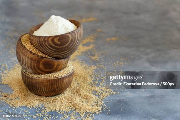 close-up of coconut on table - amarant stock pictures, royalty-free photos & images