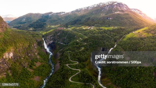 scenic view of waterfall against sky,voss,norway - voss stock pictures, royalty-free photos & images