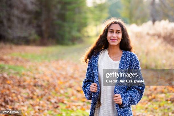 métis woman in a park - jim craigmyle portrait stock pictures, royalty-free photos & images