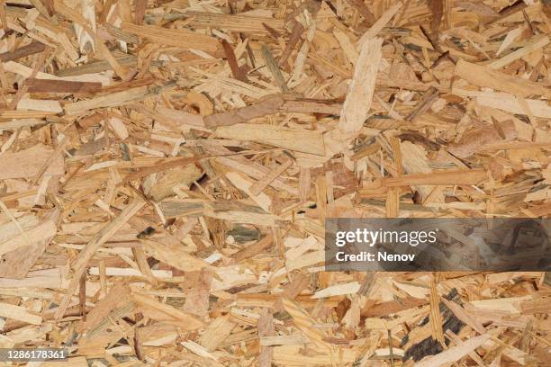 texture of raw chipboard sheet - sawdust stock pictures, royalty-free photos & images