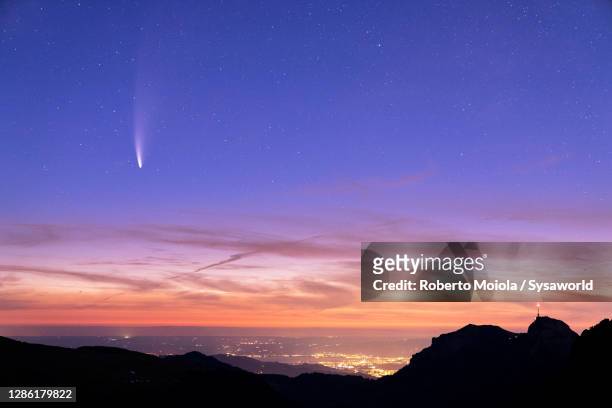 saxer lucke lit by comet neowise, appenzell, switzerland - midsummer night dream stockfoto's en -beelden