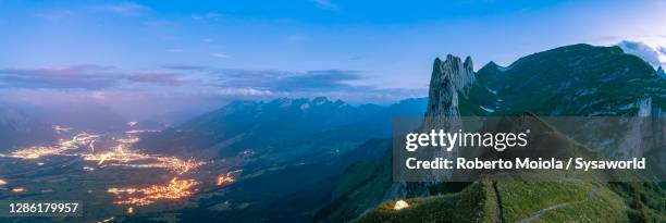 hiking tent with st.gallen on background at night, switzerland - cantón de sankt gallen fotografías e imágenes de stock