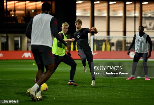 Luis Longstaff and Paul Glatzel of Liverpool during a training session at AXA Training Centre on November 17, 2020 in Kirkby, England.