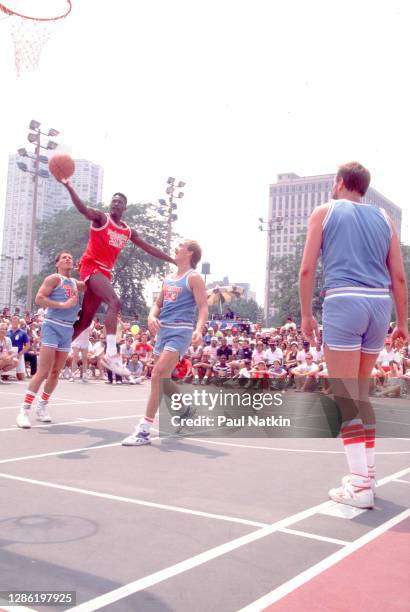 Dominique Wilkins plays in a Budweiser 3 on 3 tournament in a public park in on July 30, 1989 in Chicago, Il.