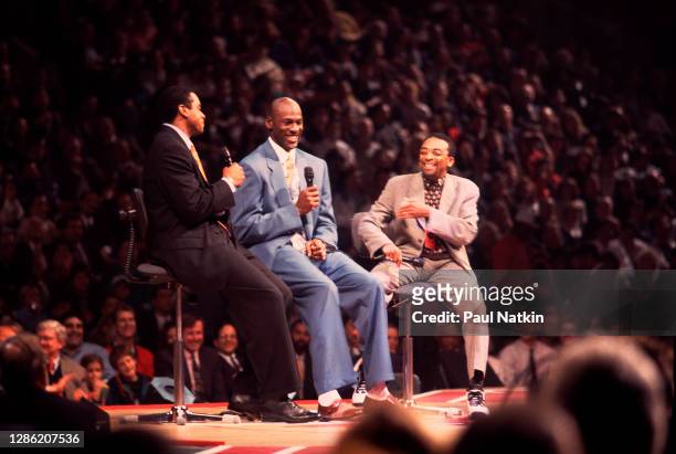 Michael Jordan retirement event. Ahmad Rashad, Michael Jordan and Spike Lee at the United Center on October 5. 1993 in Chicago, Illinois.