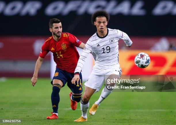 Leroy Sane of Germany is challenged by Jose Gaya of Spain during the UEFA Nations League group stage match between Spain and Germany at Estadio de La...