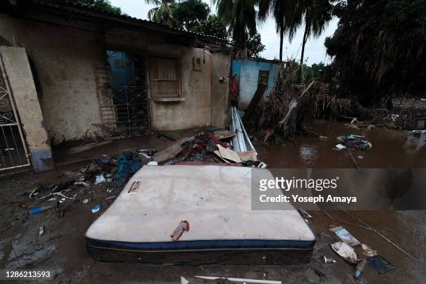 Houses severely damaged by Eta hurricane remain empty as local villagers evacuate the area ahead of Hurricane Iota on November 17, in La Lima,...