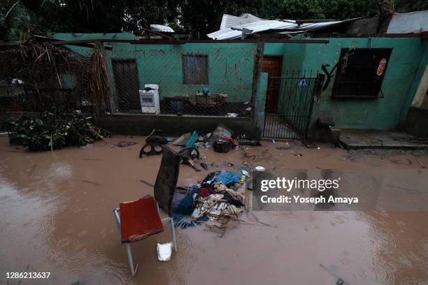 Houses severely damaged by Eta hurricane remain empty as local villagers evacuate the area ahead of Hurricane Iota on November 17, in La Lima,...