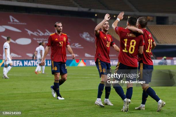 Ferran Torres of Spain celebrates his team's fifth goal with teammates during the UEFA Nations League group stage match between Spain and Germany at...