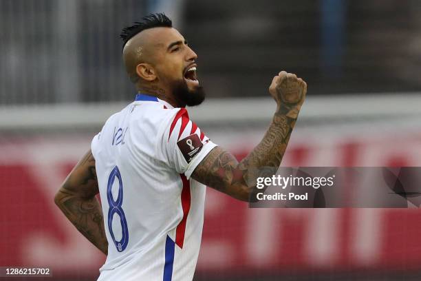Arturo Vidal of Chile celebrates after scoring the first goal of his team during a match between Venezuela and Chile as part of South American...
