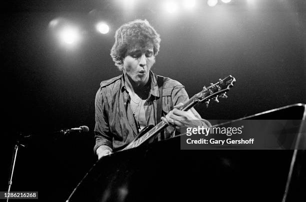 American Rock musician Neil Giraldo performs onstage at the Capitol Theatre, Passaic, New Jersey, October 10, 1980.