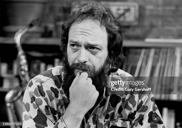 View of Scottish Rock musician Ian Anderson, of the group Jethro Tull, his hand on his chin during an interview at MTV Studios, New York, New York,...
