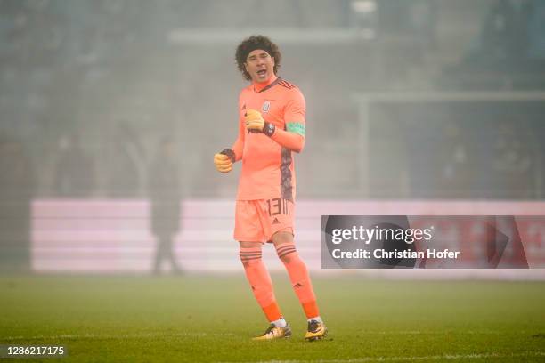 Guillermo Ochoa of Mexico celebrates after his teammate Hirving Lozano of Mexico scored their sides second goal during the international friendly...