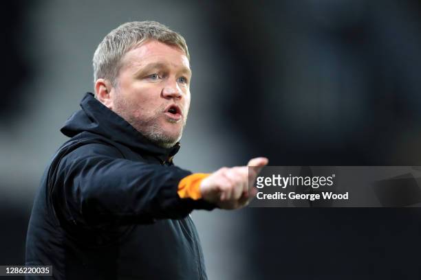 Grant McCann, Manager of Hull City gives his team instructions during the EFL Trophy match between Hull City and Grimsby Town at KCOM Stadium on...