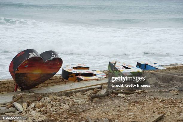 Houses and constructions severely damaged by catastrophic winds brought byr Hurricane Iota are seen on November 17, 2020 in San Andres Island,...