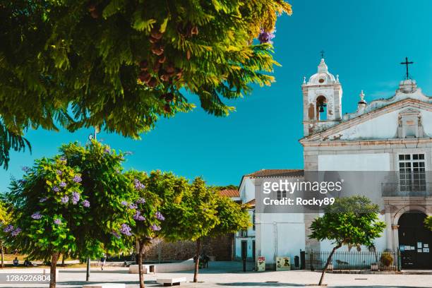 empty armazém regimental the main town square of lagos, portugal, during covid-19 lockdown restrictions - armazém stock pictures, royalty-free photos & images
