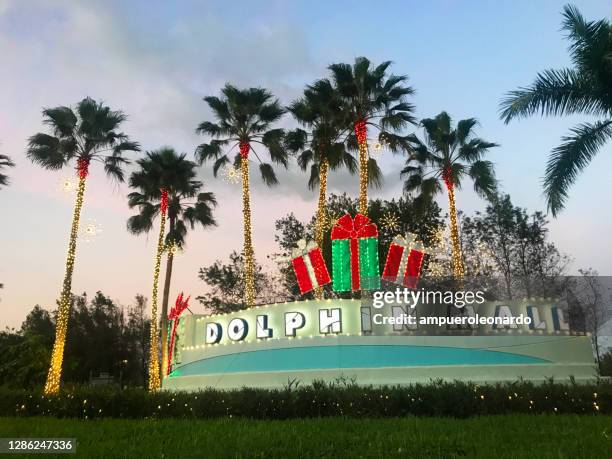 dolphin mall shopping entrance at sunset, miami, florida, usa - dadeland mall stock pictures, royalty-free photos & images