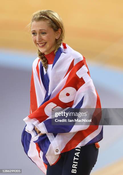 Laura Trott of Great Britain celebrates on the podium after winning the Gold medal in the Women's Omnium Track Cycling 500m Time Trial on Day 11 of...