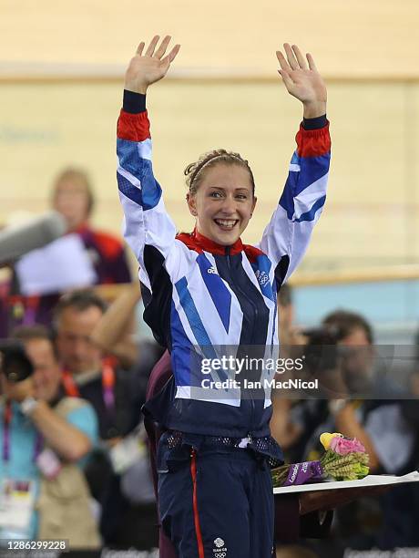 Laura Trott of Great Britain celebrates on the podium after winning the Gold medal in the Women's Omnium Track Cycling 500m Time Trial on Day 11 of...