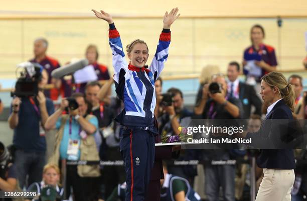 Laura Trott of Great Britain celebrates on the podium after winning the Gold medal in the Women's Omnium Track Cycling 500m Time Trial on Day 11 of...