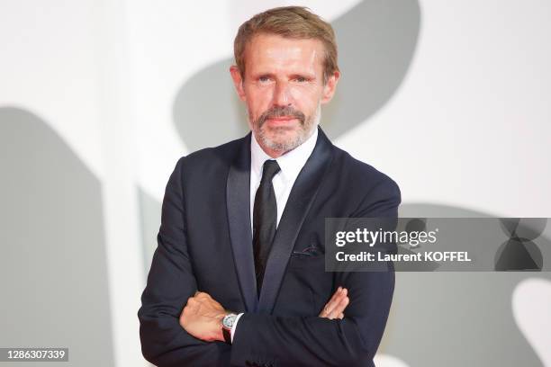 Lambert Wilson walks the red carpet ahead of the movie "The World To Come" at the 77th Venice Film Festival on September 06, 2020 in Venice, Italy.