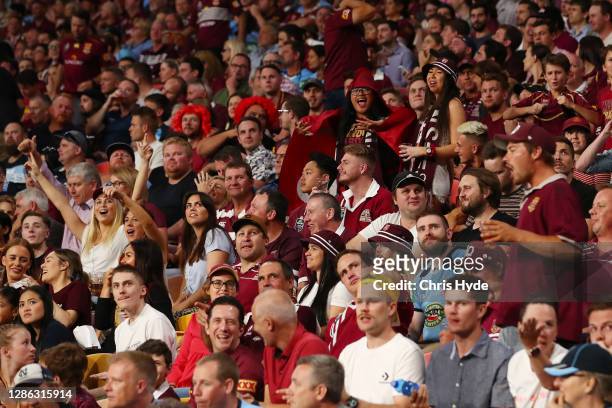 Crowds cheer during game three of the State of Origin series between the Queensland Maroons and the New South Wales Blues at Suncorp Stadium on...