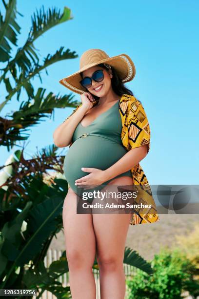 pregnancy sure has been swell for me - poolside glamour stock pictures, royalty-free photos & images