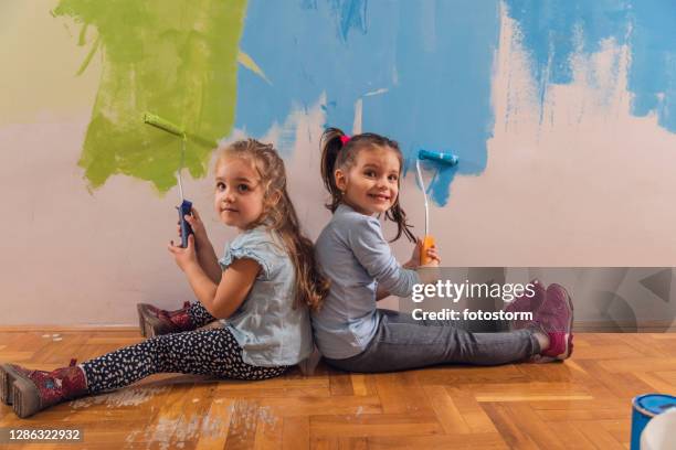 Kids Making Mess On Floor Photos and Premium High Res Pictures - Getty ...