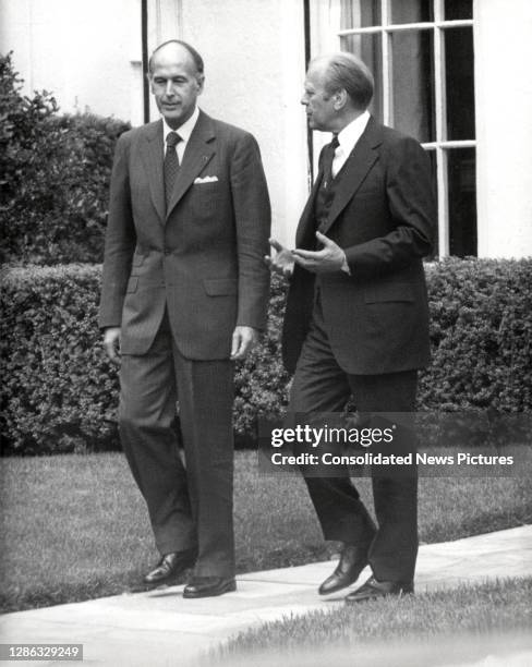 French President Valery Giscard d'Estaing and US President Gerald Ford walk together during the former's State Visit to the White House, Washington...