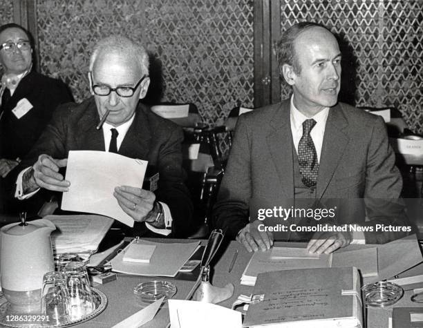 Governor of the Banque de France Oliver Wormser and French Minister of the Economy and Finance Valery Giscard d'Estaing sit together as they attend...