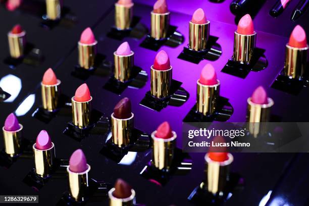 lipsticks of various colors - cosmetics industry stock pictures, royalty-free photos & images