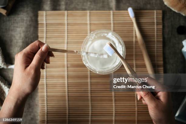 asian chinese female hands holding wooden brush and tools - baking powder stock pictures, royalty-free photos & images