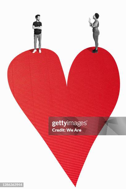 two people standing on love heart - 感情表現シリーズ ストックフォトと画像