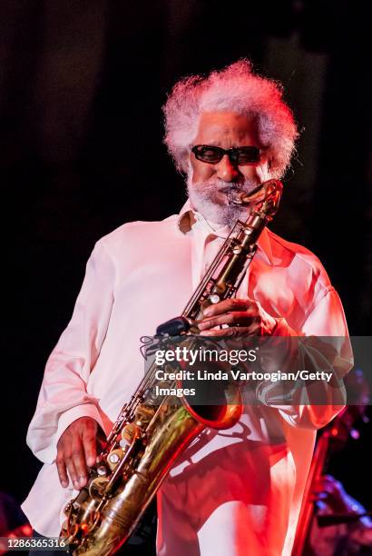 American Jazz musician Sonny Rollins plays tenor saxophone as he performs on the Main Stage at the Detroit Jazz Festival, Detroit, Michigan, August...