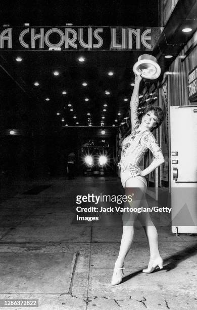 American dancer, actress, and choreographer Donna McKechnie poses under the marquee for 'A Chorus Line' outside the Shubert Theatre, New York, New...