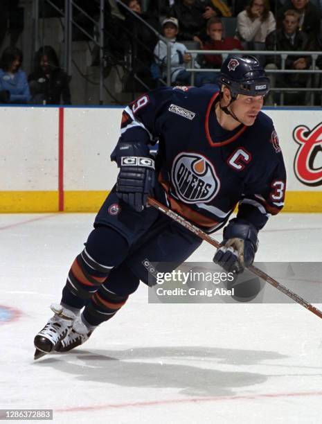 Doug Weight of the New Edmonton Oilers skates against the Toronto Maple Leafs during NHL game action on November 27, 1999 at Air Canada Centre in...