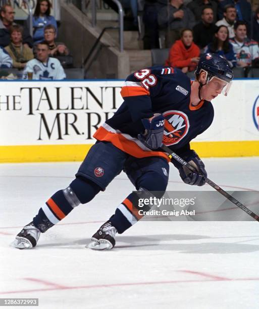 Jorgen Jonsson of the New York Islanders skates against the Toronto Maple Leafs during NHL game action on December 15, 1999 at Air Canada Centre in...