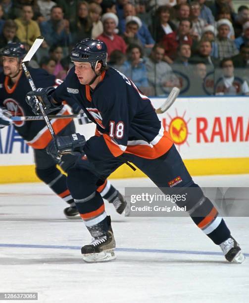 Tim Connolly of the New York Islanders skates against the Toronto Maple Leafs during NHL game action on December 15, 1999 at Air Canada Centre in...