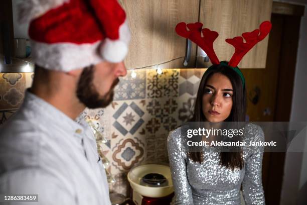 a couple fighting - quarantine christmas stock pictures, royalty-free photos & images