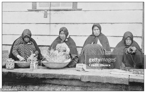 antique black and white photo of the united states: basket weavers, sitka, alaska - alaska stock illustrations