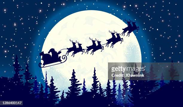 santa is coming silhouette illustration of flying santa and christmas reindeer in moonlight winter sky with pine trees - papa noel stock illustrations