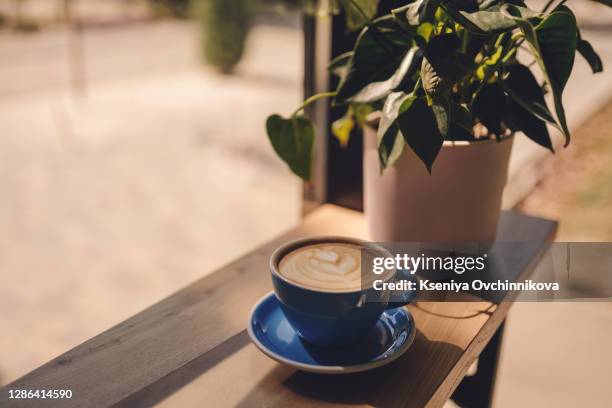 hot chocolate latte in the white coffee cup and marble background. - breakfast top view stock pictures, royalty-free photos & images