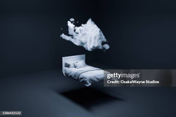 floating bed and cloud - dreamer stockfoto's en -beelden