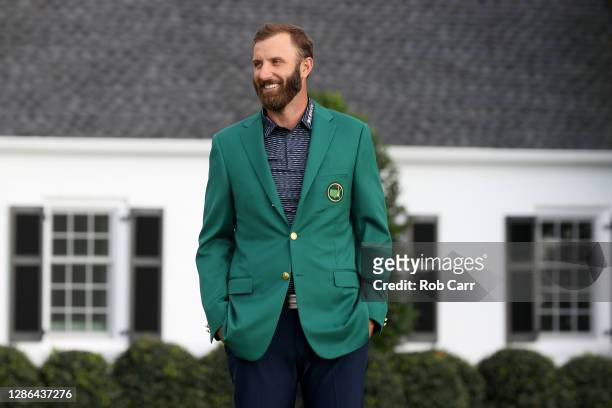 Dustin Johnson of the United States reacts during the Green Jacket Ceremony after winning the Masters during the final round of the Masters at...