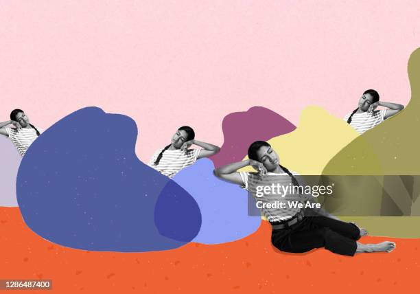 woman leaning on beanbags - preguiça conceito imagens e fotografias de stock