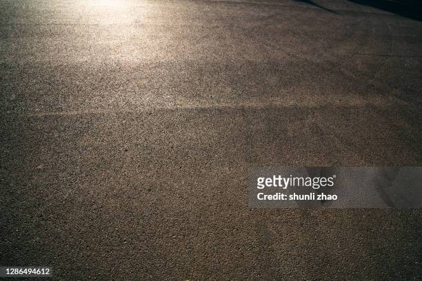 full frame shot of tarmac - asphalt von oben stock-fotos und bilder