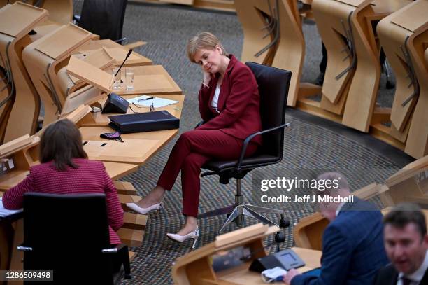 First Minister Nicola Sturgeon attends First Minister's Questions at the Scottish Parliament on November 19, 2020 in Edinburgh, Scotland. The First...