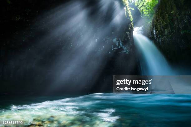 waterfalls with morning ray of light - running water stream stock pictures, royalty-free photos & images