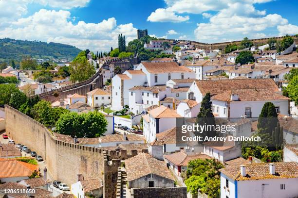 portugal, obidos town and fortress in a sunny, spring day. - portugal stock pictures, royalty-free photos & images