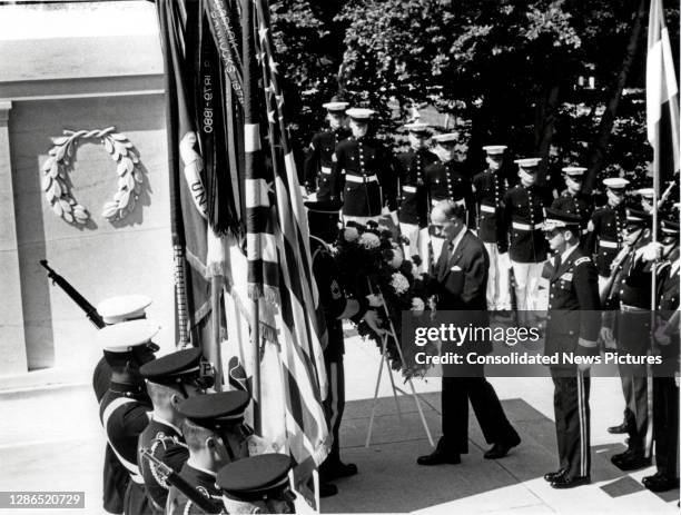 Elevated view of French President Valery Giscard d'Estaing as he lays a wreath at the Tomb of the Unknown Soldier at Arlington National Cemetery,...